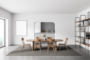 White kitchen interior with table and poster