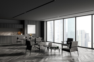 Gray and wooden kitchen corner- with table and poster