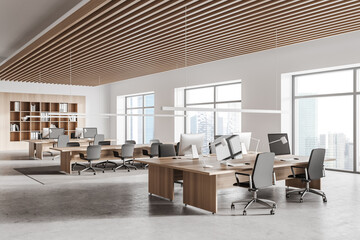 White and wooden open space office corner