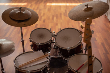 Fototapeta na wymiar Rear view of drum kit shot indoors