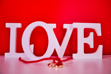 word love white and yellow gold rings