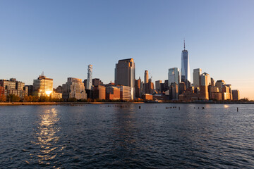 Fototapeta na wymiar Beautiful Tribeca and Lower Manhattan New York City Skyline along the Hudson River during a Sunset