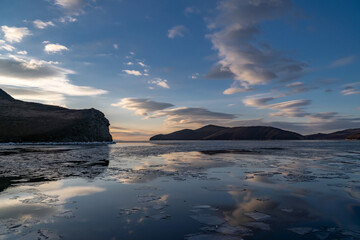 Fototapeta na wymiar Reflection of the sky in the water of Lake Baikal