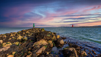 Howth Harbour in Dublin panorama under a dramatic stormy cloudy sky 