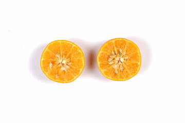 Shiny fresh oranges. From the side view. The concept of placing fresh oranges is combined with a bright background, commonly used for design templates and mockups. Beautiful shape of an orange sliced.