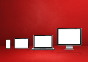 computer, laptop, mobile phone and digital tablet pc. red background