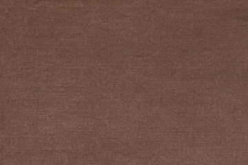 Fototapeta na wymiar Texture of brown fabric for clothing.