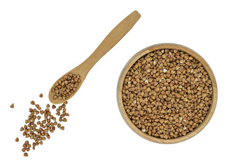 Buckwheat groats in a bowl and wooden spoon isolated on white