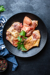 pieces of raw chicken, rooster or goose fresh farm meat ready to eat on the table for healthy meal snack outdoor top view copy space for text food background image rustic keto or paleo diet