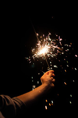 sparkler in hand
