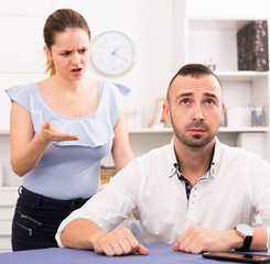 Fototapeta premium Sad male is depressing and husband is supporting him at home.