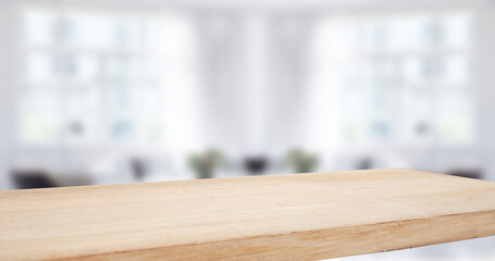 empty wooden table on background of abstract blur white interior, montage, product display, inside and window..