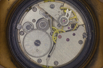 Fototapeta na wymiar Old and worn watch movement close up