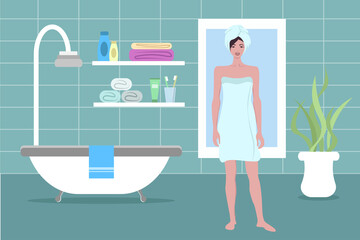 Girl in a towel in the bathroom