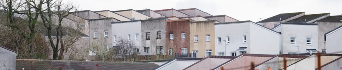 Derelict council house in poor housing estate slum with many social welfare issues in Port Glasgow
