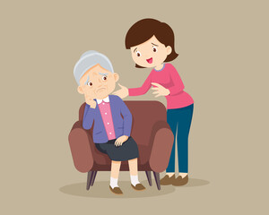 Sad elderly woman sitting and woman comforting
