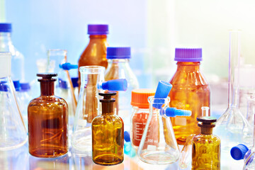 Laboratory glass bottles and flasks in store