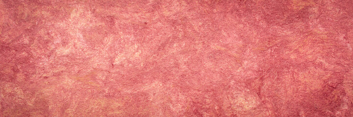 background and texture of burgundy, handcrafted, Mexican amate bark paper made of amate, nettle and mulberry trees, panoramic web banner