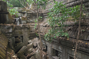 Ruins of the Beng Mealea temple invaded by the roots and trees, Angkor, Siem Reap, Cambodia, Asia