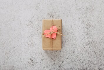 Flat lay Happy Valentine's Day photography with gift box and paper origami heart on wooden...