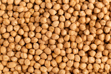 Raw dry chickpeas background close-up top view