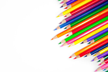 An assortment of colored pencils on white background