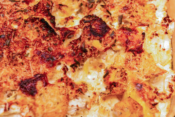 crusty cheese on top of potato and cauliflower