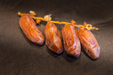 Four dates branch on slate