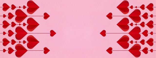 Valentine's Day love wedding background banner panorama greeting card template - Red hanging hearts isolated on pink paper texture