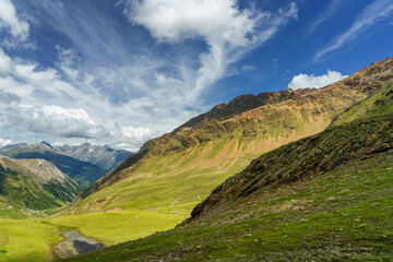 Obraz premium Mountain landscape along the road to Stelvio pass (Lombardy) at summer