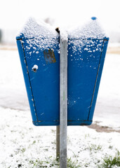 Dual garbage bin in the snow