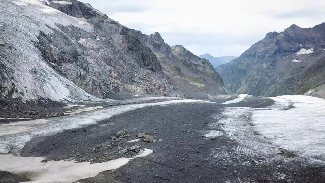 Aerial stablishing shot of the Grindelwald glacier in the Swiss alps in Europe