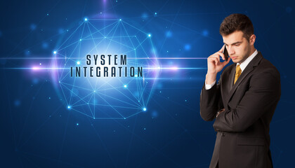 Businessman thinking about security solutions with SYSTEM INTEGRATION inscription