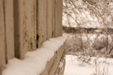 fence in winter snow