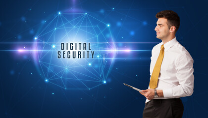 Businessman thinking about security solutions with DIGITAL SECURITY inscription