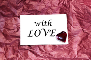 pink paper , heart on pink background. Romantic love letter for Valentine's day concept.