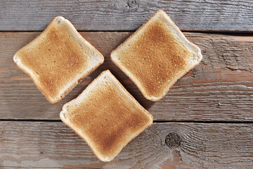 Three slices of toasted bread