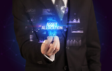 Businessman holding lightbulb with ASSET ALLOCATION inscription, Business idea concept