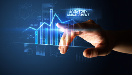 Hand touching INVENTORY MANAGEMENT button, business concept