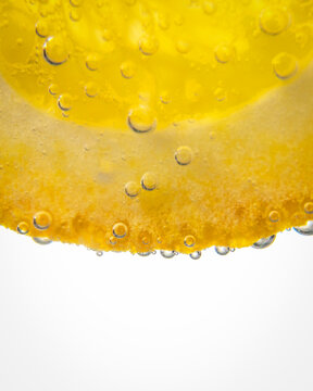 Orange slice bubbles in flovered water