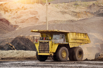 Mining Truck,Open pit mining of iron ore and magnetite ores.Loading the iron ore into heavy dump...