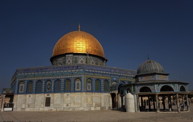 Fototapeta na wymiar Golden domed mosque