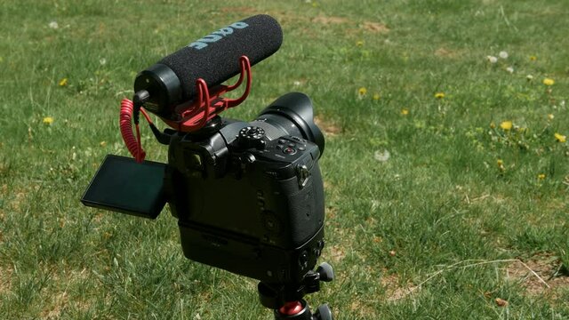 a camera on a tripod, making timelapse