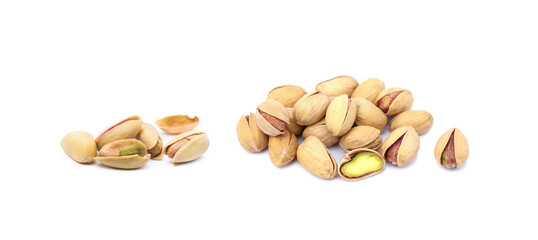 Pile of fresh pistachios isolated on white background
