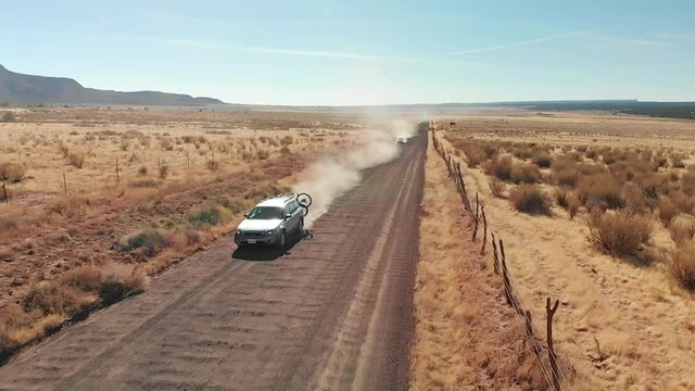 Low Aerial as Silver Station Wagon with Bike Rack Passes Underneath