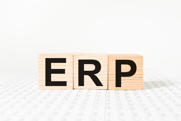 a word ERP on wooden cubes. business concept. business and Finance