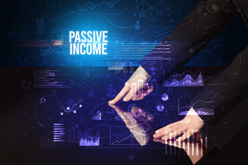 Businessman touching huge screen with PASSIVE INCOME inscription, cyber business concept