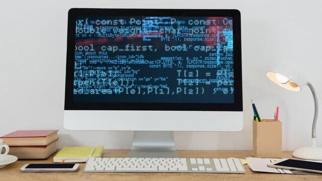 Digital composition of data processing on computer screen on wooden table against white background