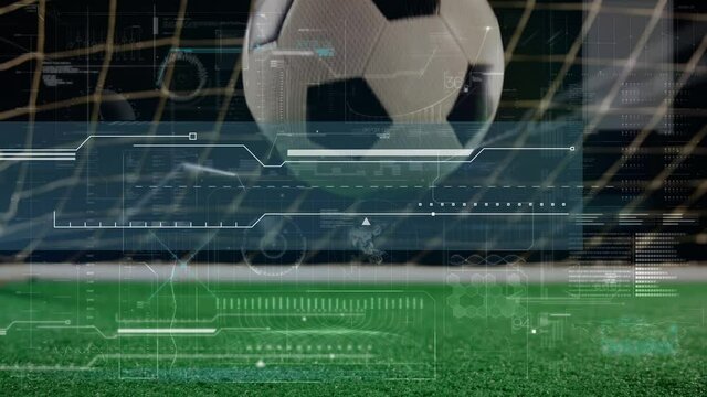 Animation of digital data processing over football bouncing on pitch in front of net