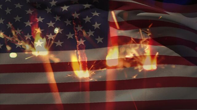 Animation of close up of sparklers against american flag waving